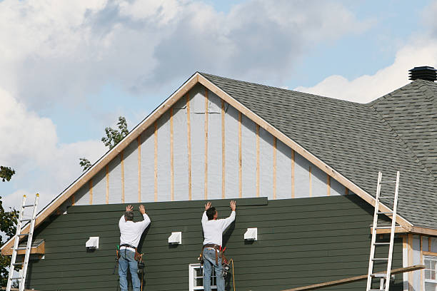 Professional Storm Damage Siding Repair technician working in South Saint Paul, MN